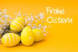 Beautiful colorful Easter eggs. Easter concept isolated on orange or yellow background.